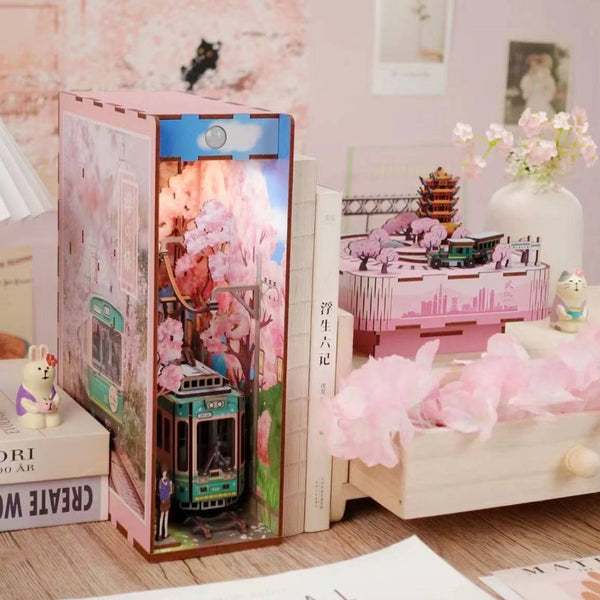 Japanese Sakura Densya DIY Book Nook Kit, A charming miniature 3d wooden puzzles the captures the essence of springtime in Japan, perfect for bookshelf decor or a delightful gift for Japanese culture lovers.