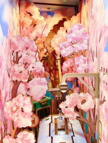 Japanese Sakura Densya DIY Book Nook Kit, A charming miniature 3d wooden puzzles the captures the essence of springtime in Japan, perfect for bookshelf decor or a delightful gift for Japanese culture lovers. Scene 3