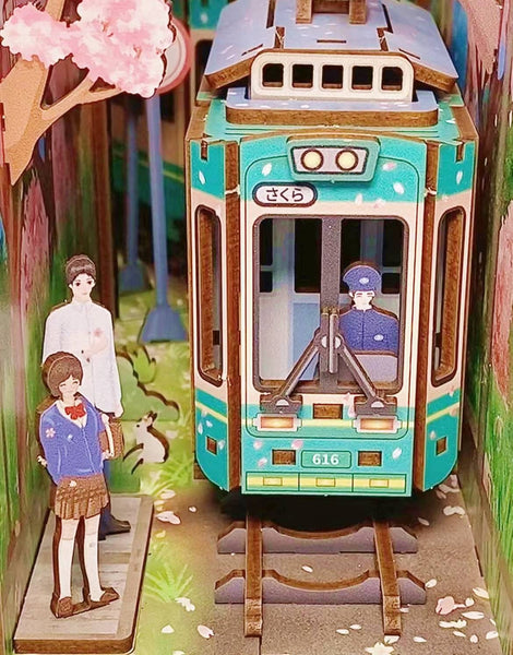 Japanese Sakura Densya DIY Book Nook Kit, A charming miniature 3d wooden puzzles the captures the essence of springtime in Japan, perfect for bookshelf decor or a delightful gift for Japanese culture lovers. Scene 4
