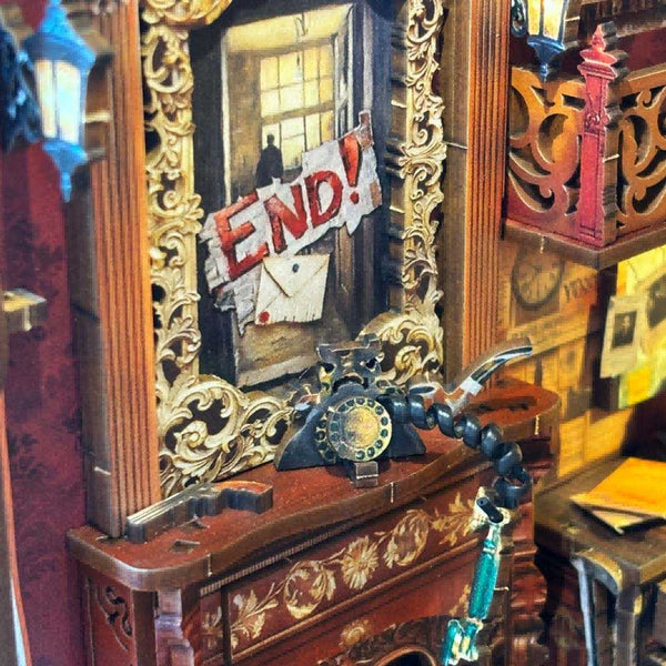 close up left side in the Bell's Mystery DIY Book Nook Shelf Insert, including the miniature fireplace, retro mirror, and gun